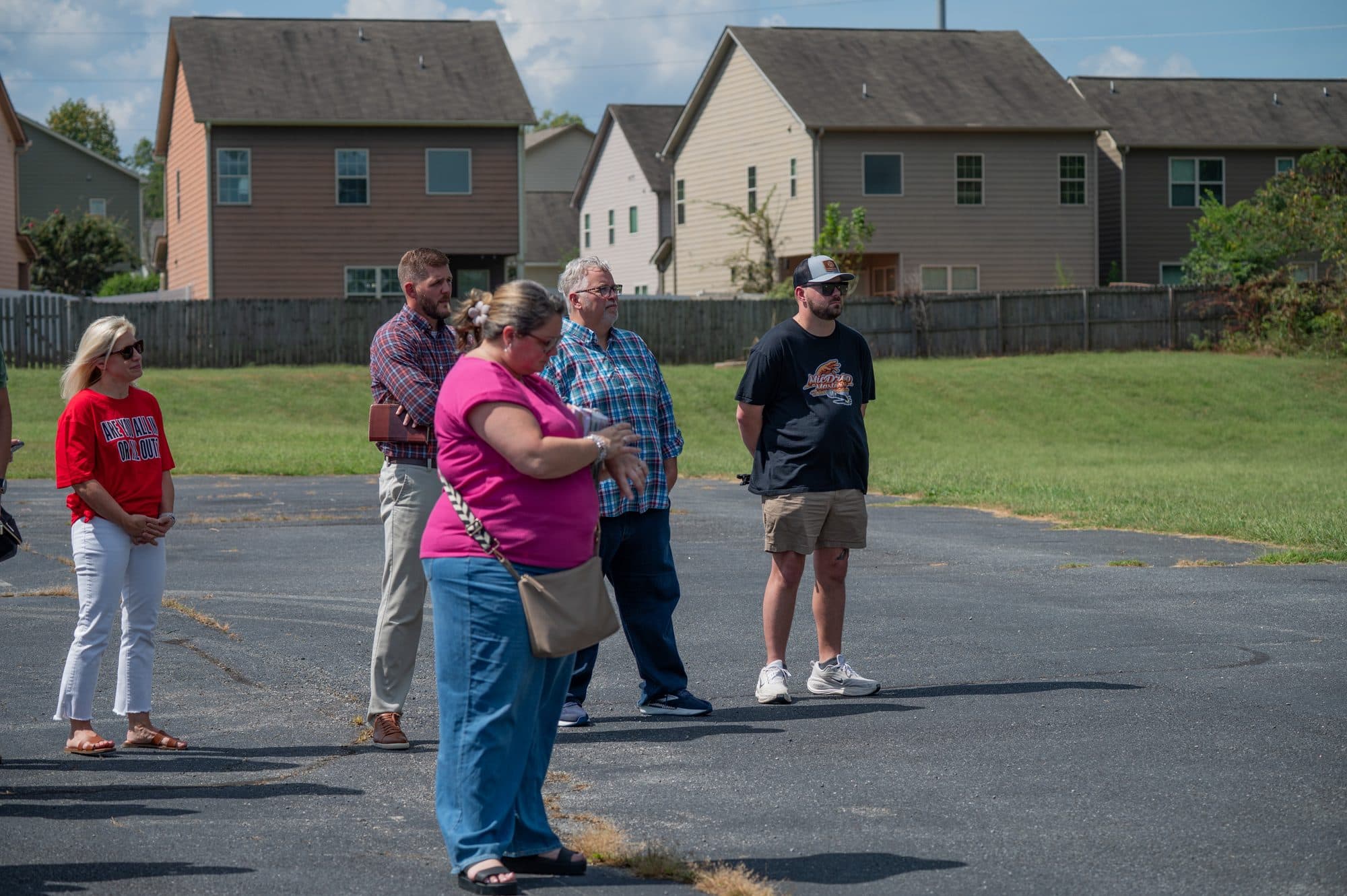 Guests gathered on site for the Redemption Village tiny homes groundbreaking.