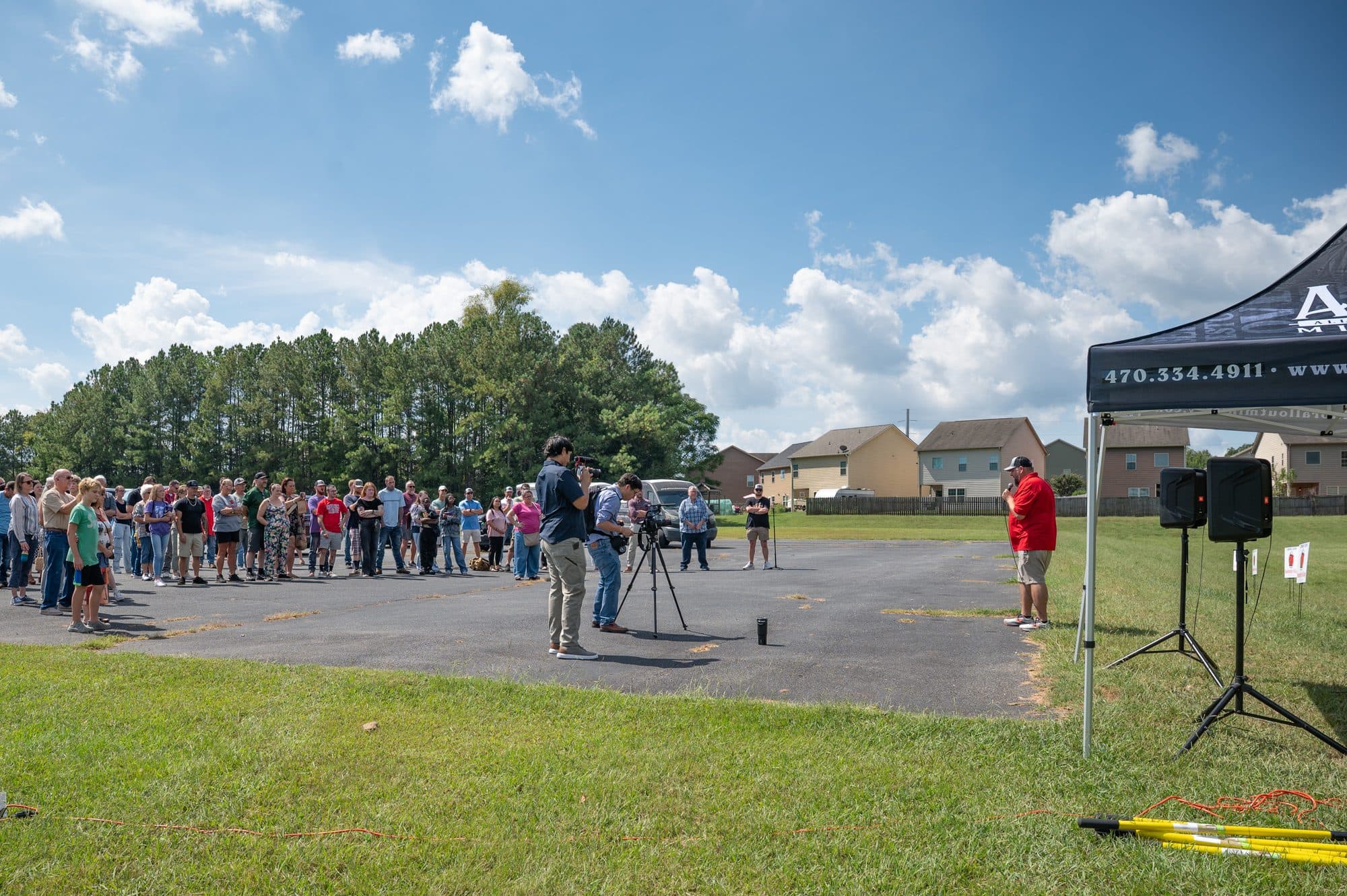 Guests gathered on site for the Redemption Village tiny homes groundbreaking.