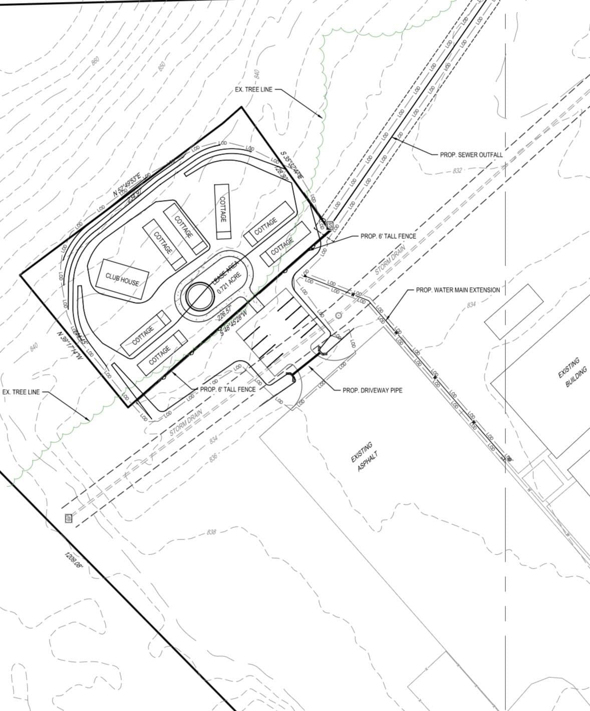 Architectural site plan showing a cluster of cottages, a clubhouse, fencing, and walking paths